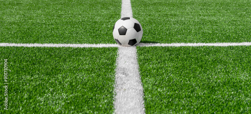 Black and white soccer and football ball in the field. Horizontal sport theme poster  greeting cards  headers  website and app