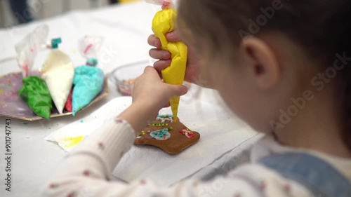 Creative Kids Having Fun Decorating Delicious Gingerbread Cookies with Colorful Icing
