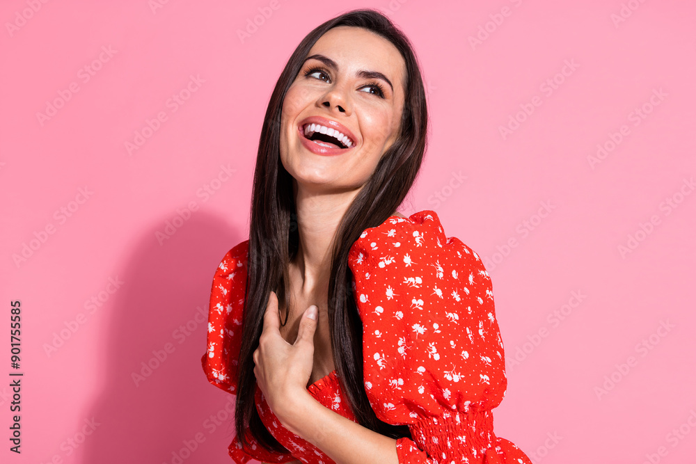 Photo portrait of latin beautiful happy young gorgeous lady daydreaming in red glamour dress looking novelty isolated on pink color background Photo portrait of latin beautiful happy young gorgeous lady daydreaming in red glamour dress looking novelty isolated on pink color background