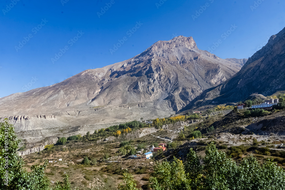 Fototapeta premium Beautiful mountain scenery. River, valley, snow, blue sky, white clouds. In-depth trip on the Sonamarg Hill Trek in Jammu and Kashmir, India