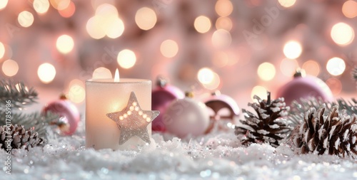 Candle With Star Decoration on Snowy Surface