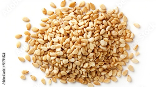 Front view of a wooden scoop filled with Organic White Sesame seeds (Sesamum indicum) or Til. Isolated on a white background.
