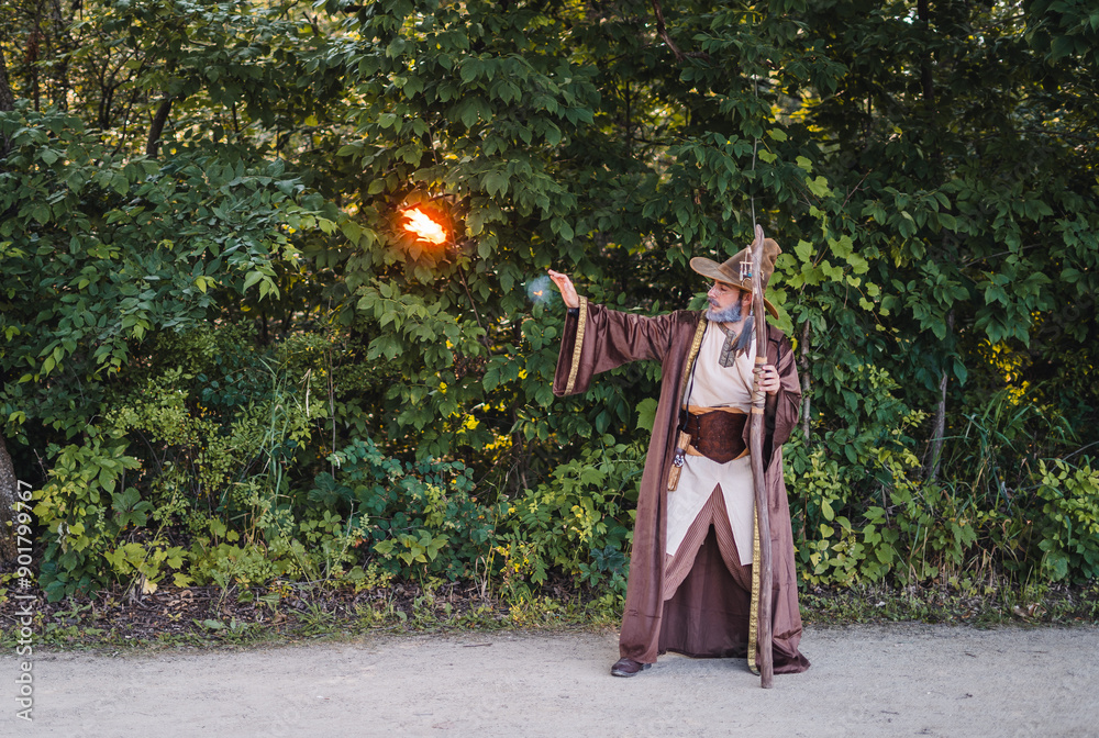 wizard firing a fireball in the forest wizard firing a fireball in the forest