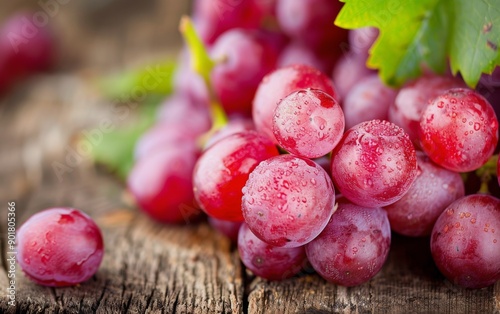 Red Grapes With Dew on Wooden Surface