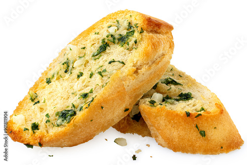 Two slices of garlic bread with fresh parsley isolated on white.