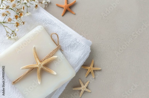 White Soap On Towels With Starfish And Flowers