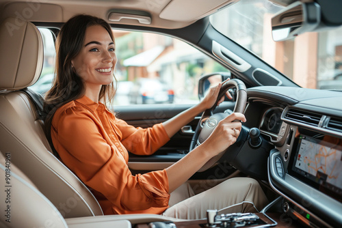 A woman driving a car with a modern navigation system photo