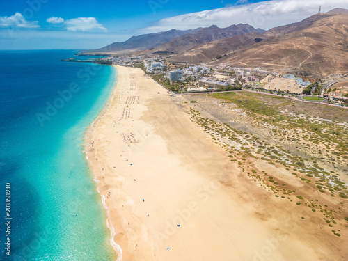 White sandy beach and blue water in Morro Jable, south of Fuerteventura, Canary islands