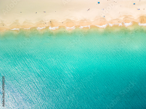 White sandy beach and blue water in Morro Jable, south of Fuerteventura, Canary islands photo