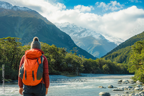 Adventurer taking in the stunning landscapes of New Zealand South Island.