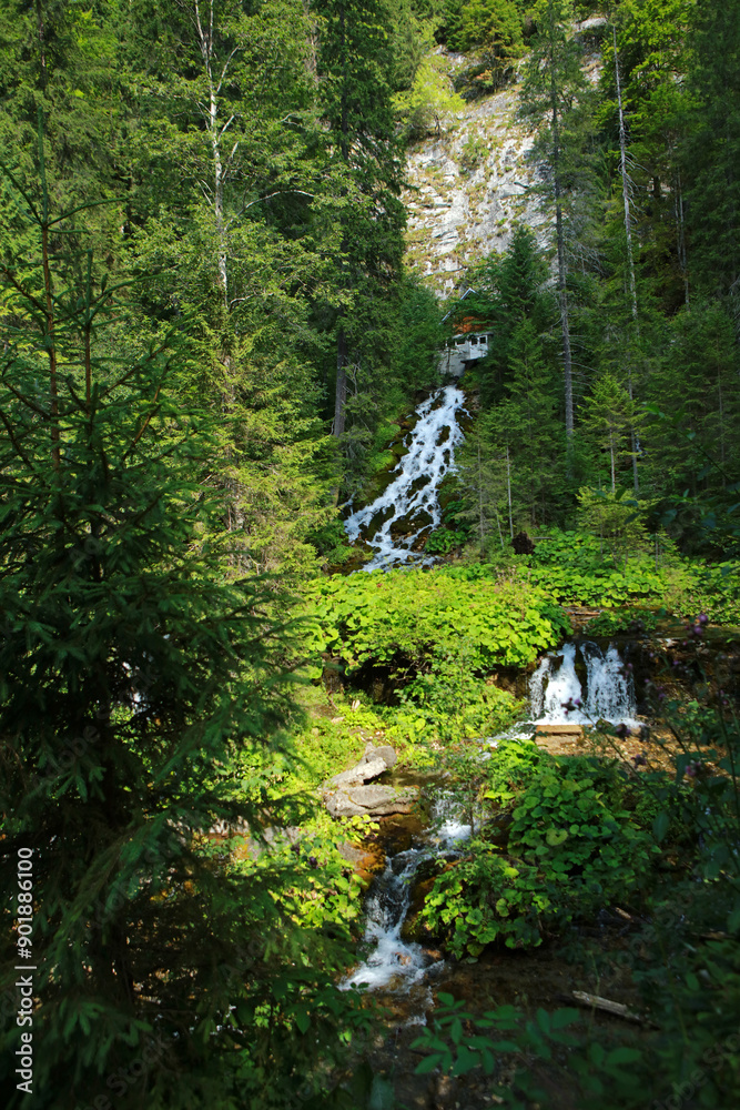 Cascada Sapte Izvoare - Seven Springs Waterfall near Scropoasa lake in the Bucegi Mountains, Romania