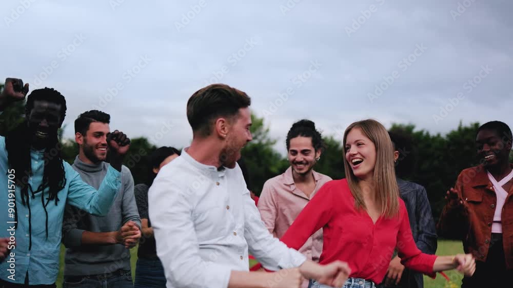 Music party, Young people dancing at park festival. Multiracial happy friends enjoy together during weekend summer celebration Music party, Young people dancing at park festival. Multiracial happy friends enjoy together during weekend summer celebration