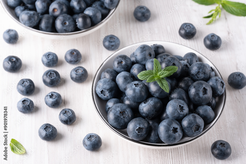 Fresh blueberries on a wooden white table Fresh blueberries on a wooden white table