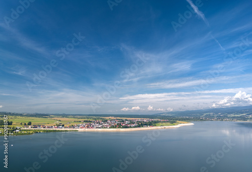 Obraz na płótnie Summer skyline cityscape of Frydman village at Czorsztyn lake (Jezioro Czorsztyńskie) in Lesser Poland (Małopolska), Poland. Wide panoramic aerial view w salonie