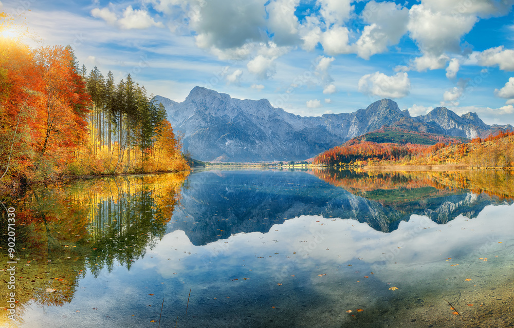 Fototapeta premium Breathtaking autumn scene of sunny morning on Almsee lake.