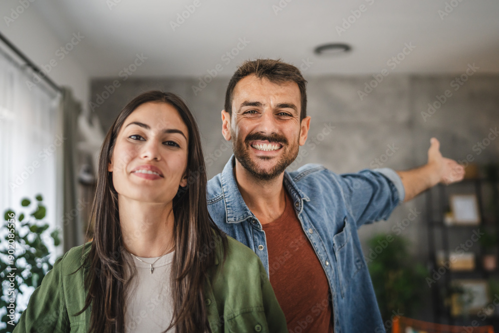 Portrait of beautiful couple stand, smile and hug at home Portrait of beautiful couple stand, smile and hug at home