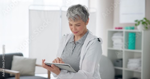 Wallpaper Mural Typing, tablet and mature woman in office, smile and proud to help with patience, reading and schedule. Physical therapist, confident and check of results for appointment, equipment and clinic Torontodigital.ca