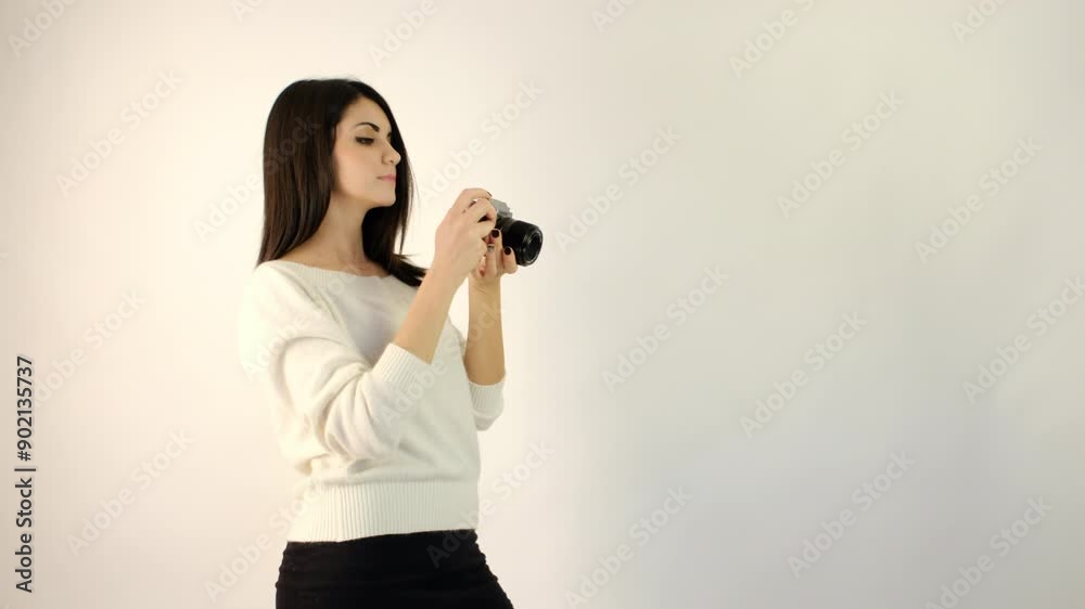 beautiful brunette italian girl shoots with camera in studio. High quality 4k footage beautiful brunette italian girl shoots with camera in studio. High quality 4k footage