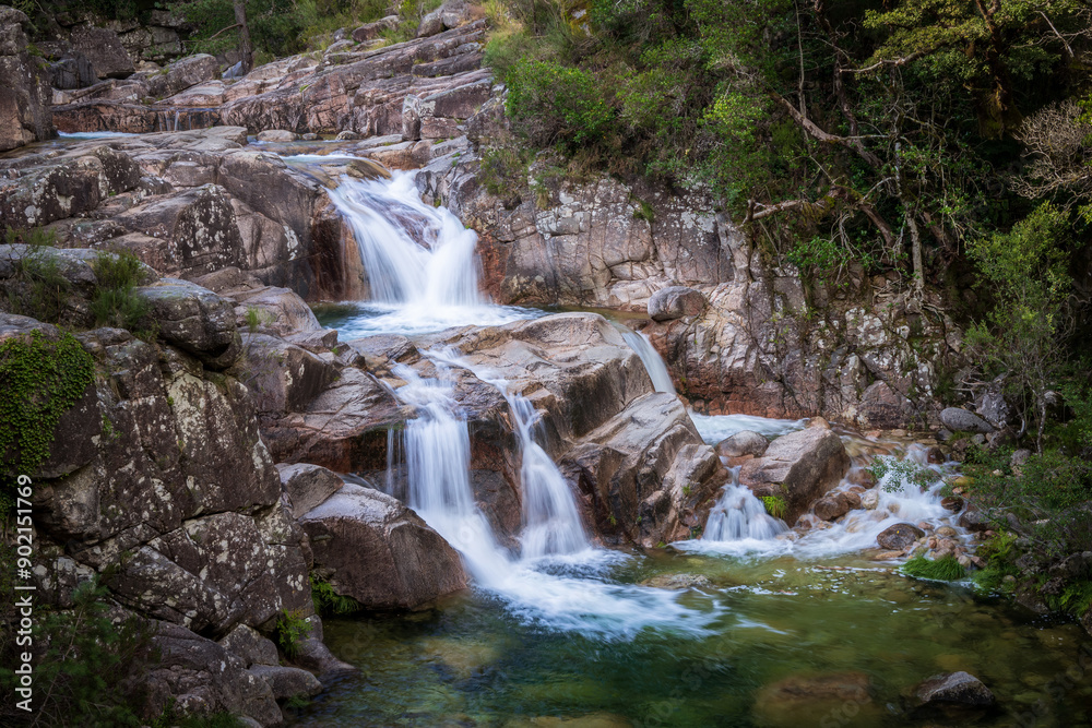 Waterfalls in Rio Homem river at Mata de Albergaria forest in Peneda-Geres National Park, Portugal Waterfalls in Rio Homem river at Mata de Albergaria forest in Peneda-Geres National Park, Portugal