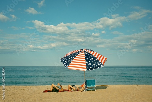 American flag umbrella on the beach, Salisbury Beach, Massachusetts photo