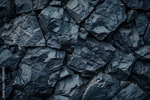 Black dark textured rock surface, natural patterns background.