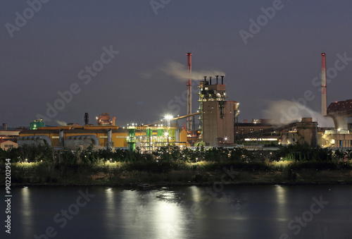 Nam-gu, Pohang-si, Gyeongsangbuk-do, South Korea - December 15, 2022: Night view of Hyeongsan River and POSCO ironworks factory with smoke
 photo