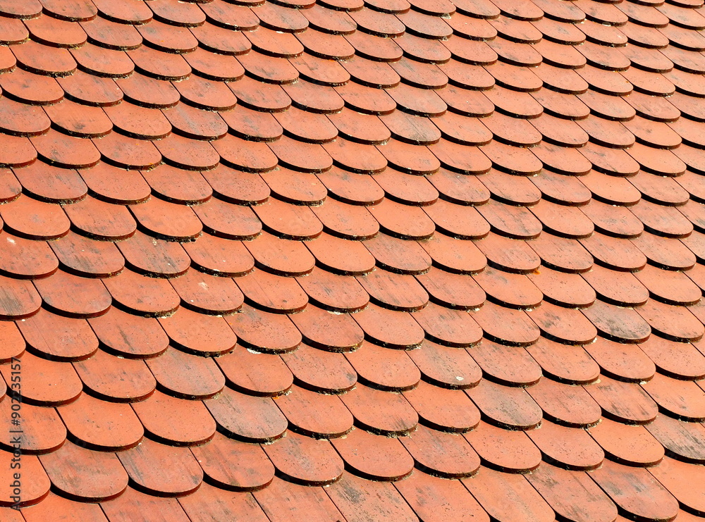 red round tiles on the roof, traditional red roof, close up and details red round tiles on the roof, traditional red roof, close up and details