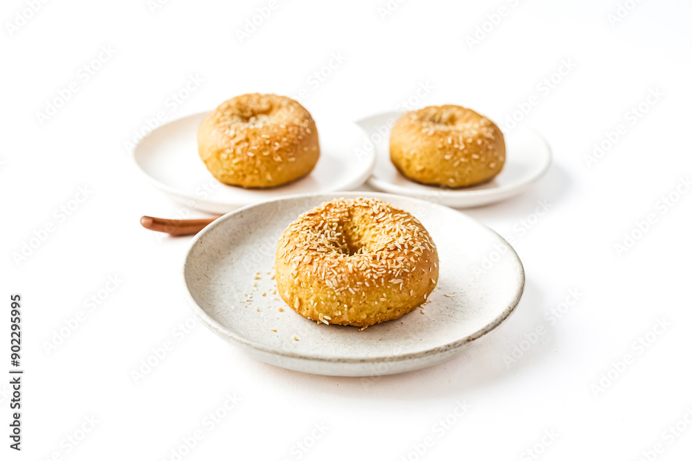 Coconut-Topped Doughnut on a White Plate
