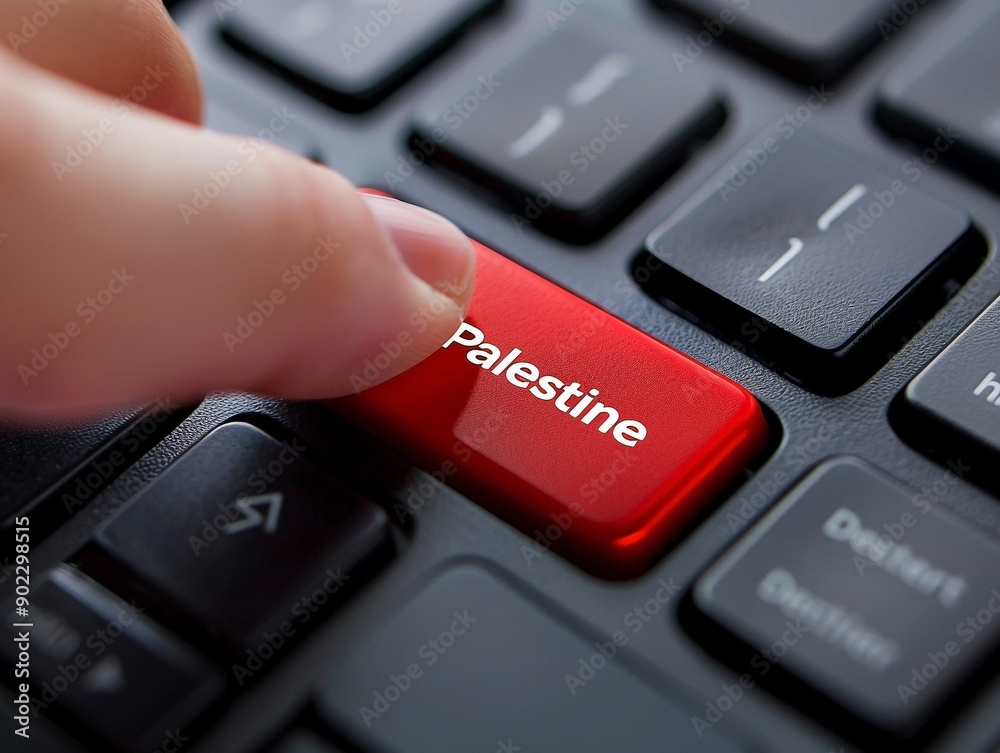 Close-Up of Finger Pressing Red Palestine Button on Computer Keyboard Close-Up of Finger Pressing Red Palestine Button on Computer Keyboard