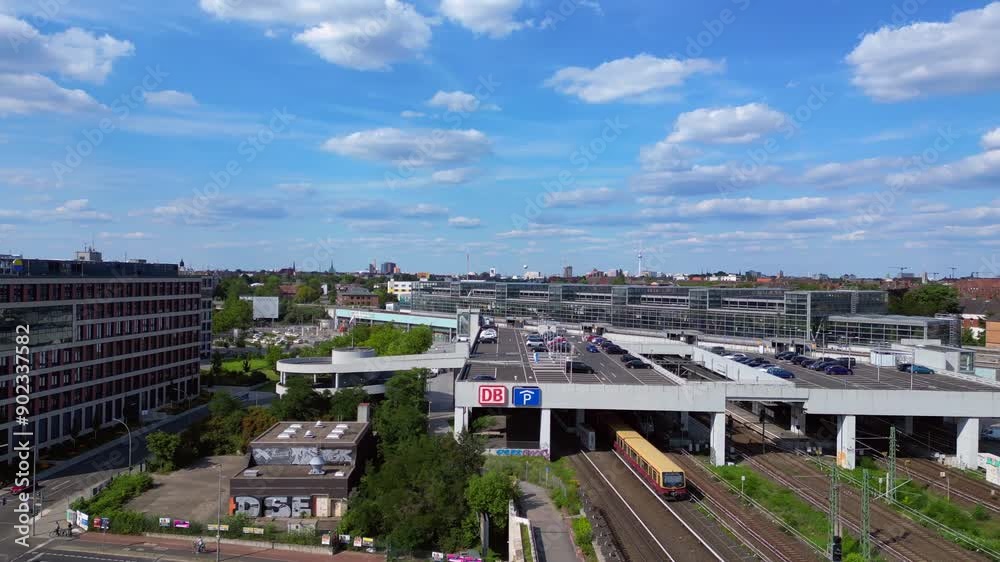 connecting people, departure arriving train at berlin modern train station. Perfect aerial view flight rotation to right drone