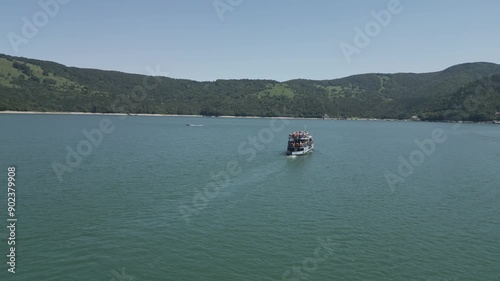 tourist aboard a summer Lake Bicaz tourism boat in the Romanian vacation hotspot