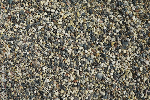 Close-up of Colorful Pebbles and Gravel - Natural Background Texture for Landscaping and Decor