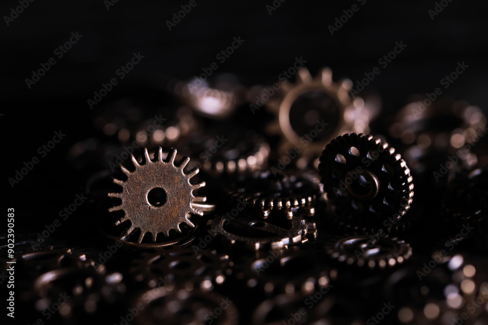 Close-Up of Bronze Gears in Low Light - Industrial Machinery Components Close-Up of Bronze Gears in Low Light - Industrial Machinery Components