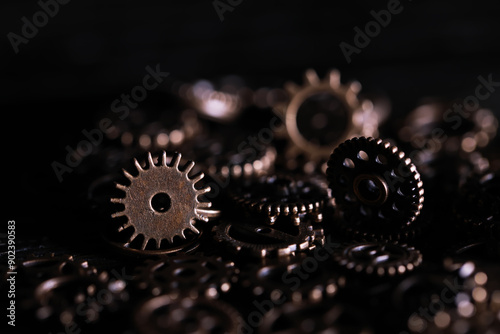 Close-Up of Bronze Gears in Low Light - Industrial Machinery Components photo