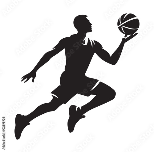 Silhouette of Basketball Player in Action Jumping with Ball
