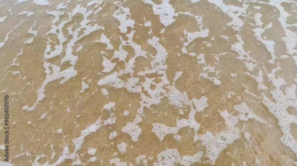 Beach sand and waves at Repulse Bay Beach, Hong Kong Beach sand and waves at Repulse Bay Beach, Hong Kong