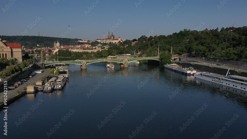 Aerial view of the historical center of Prague and the Vltava river in the morning on a clear sunny summer day Aerial view of the historical center of Prague and the Vltava river in the morning on a clear sunny summer day