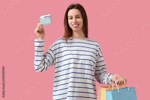 Beautiful woman with credit...