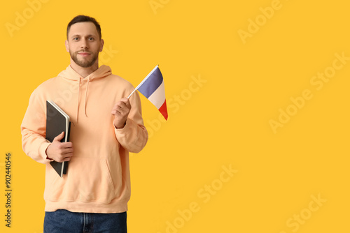 Young man with flag of Fran...