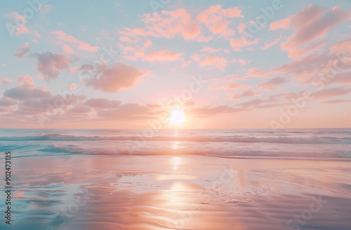 Beautiful sunset over the ocean with clouds in pastel colors on a sandy beach
