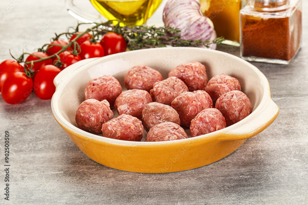 Uncooked raw beef meatball minced Uncooked raw beef meatball minced