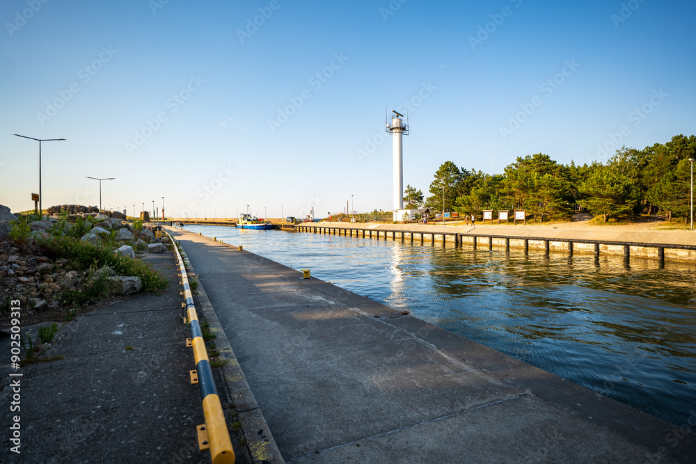 Seaport in Łeba. Summer resort. Beautiful sunny afternoon. Radar station in the background. Leba, Baltic sea, Poland