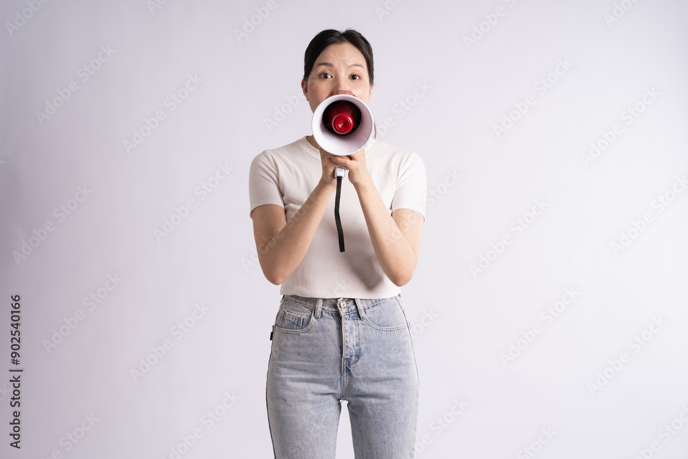Obraz premium Portrait of beautiful Asian woman posing on white background