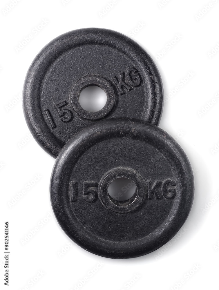 Two weight plates isolated on white background. High angle view. Two weight plates isolated on white background. High angle view.