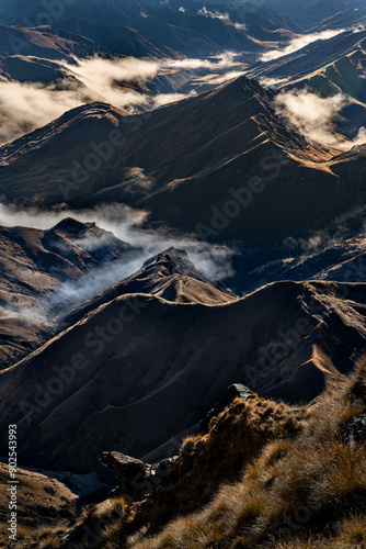 magnificant mountains in morning sunlight with fog photo