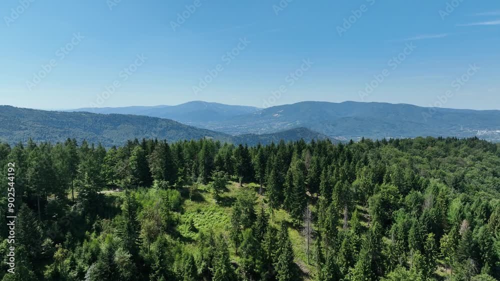 Beskid summer mountains panorama. Stunning Aerial Drone View of Summer Green Forests in the Beskid Mountains, Bielsko Biala, Magurka Wilkowicka. Beskid summer mountains panorama. Stunning Aerial Drone View of Summer Green Forests in the Beskid Mountains, Bielsko Biala, Magurka Wilkowicka.