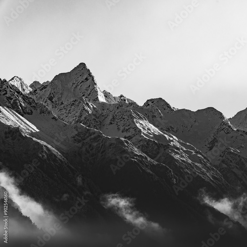 snow mountain landscape covered in fog