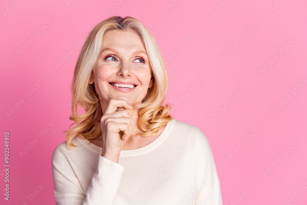 Photo of charming dreamy pretty adorable woman wear stylish clothes look empty space isolated on pink color background Photo of charming dreamy pretty adorable woman wear stylish clothes look empty space isolated on pink color background