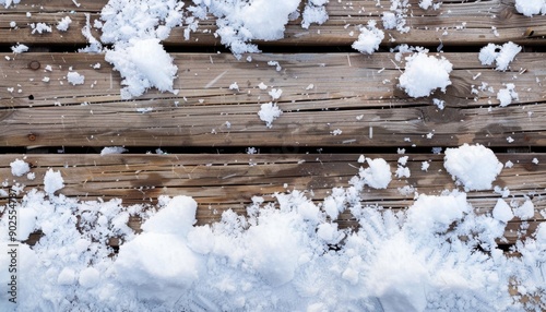 Snow-Covered Wooden Deck Boards In Winter photo