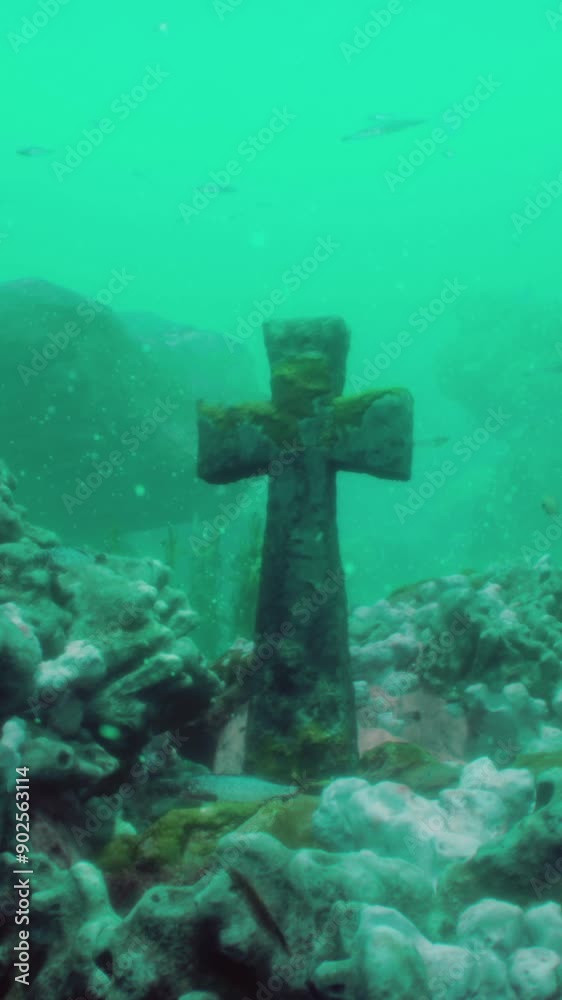 Crosses underwater in sunken cemetery on bottom of volcanic origin in Atlantic